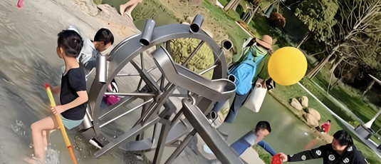 Themed Water-Integrated Windmill Ride