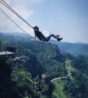 High-Altitude 360° Rotating Cliff Swing