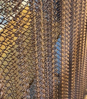 Rideau métallique composite anti-bruit et ignifugé