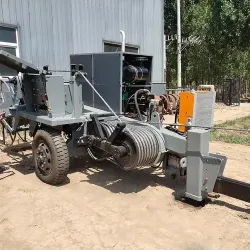 Tendeur hydraulique et tireur monté sur camion