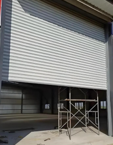 ประตูม้วนล้อทนลมหนักสำหรับโรงงานอุตสาหกรรม