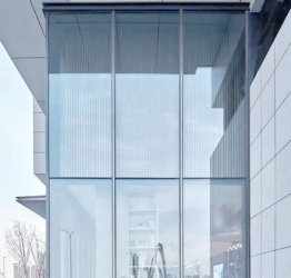 Mur rideau vitré à cadre caché unitaire