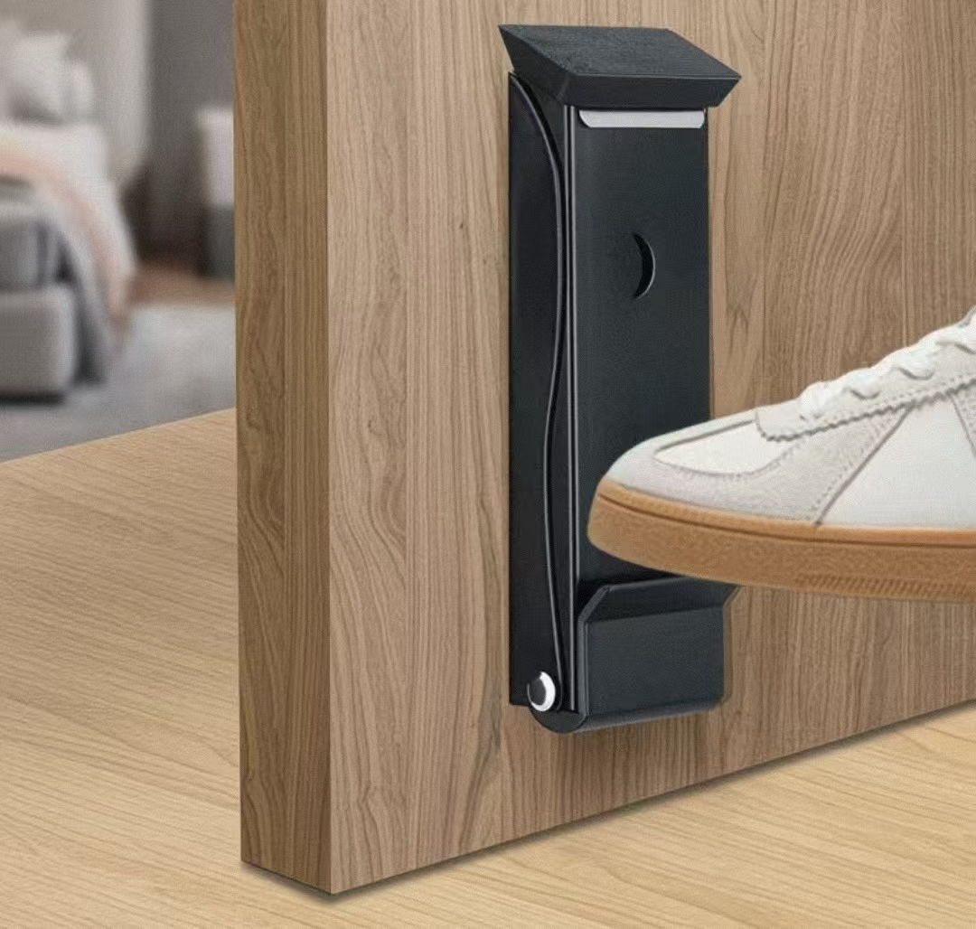 Butée de porte robuste à commande au pied