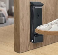 Butée de porte robuste à commande au pied