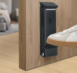 Butée de porte robuste à commande au pied