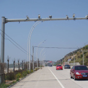 Highway-Specific Long-Crossarm Surveillance Pole